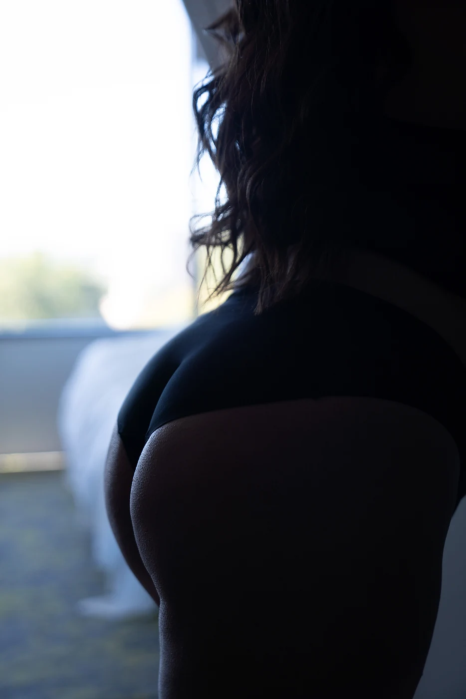 Moody portrait in black lingerie